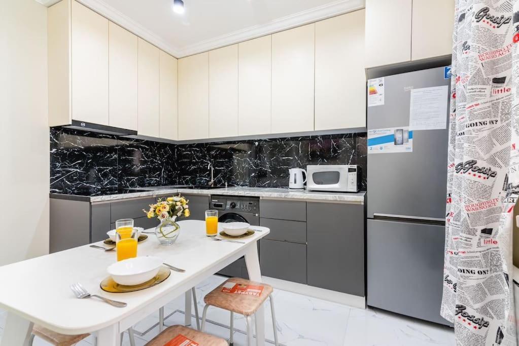 1ком рядом с метро сайран и адк Apartment Almaty